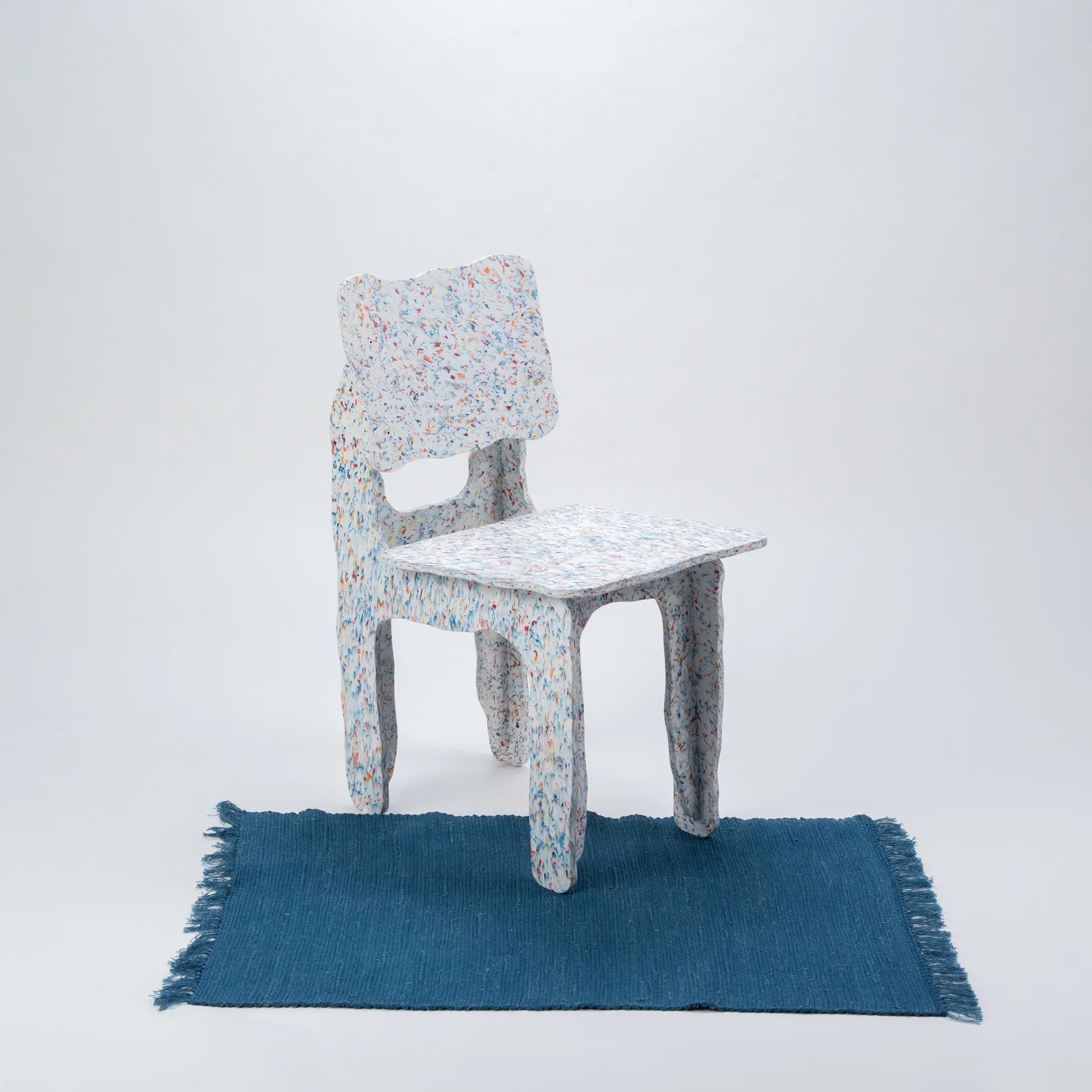 FLAT PACK PLASTIC CHAIR